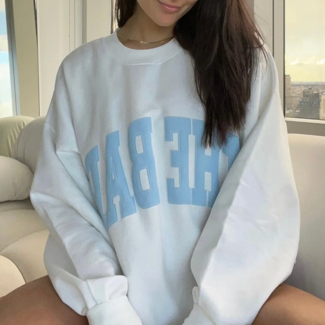 VARSITY SWEATSHIRT WHITE/BABY BLUE